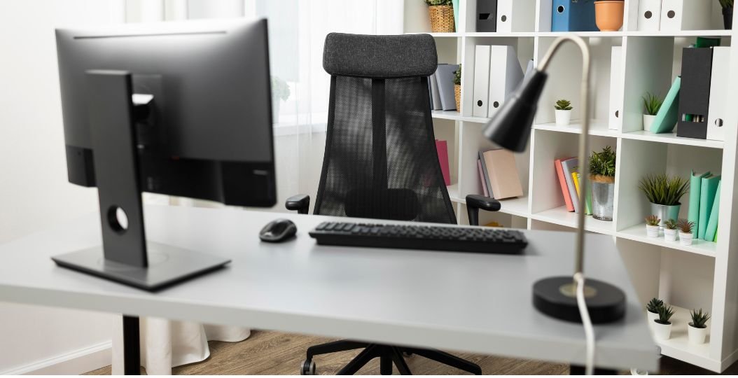 What is Office Furniture? A Comprehensive Guide to Office Furniture 1 photo of front view of office desk with computer and chair